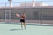 Pahrump Valley High School tennis senior Elise Eichner returns a comfortable serve in a home le ...