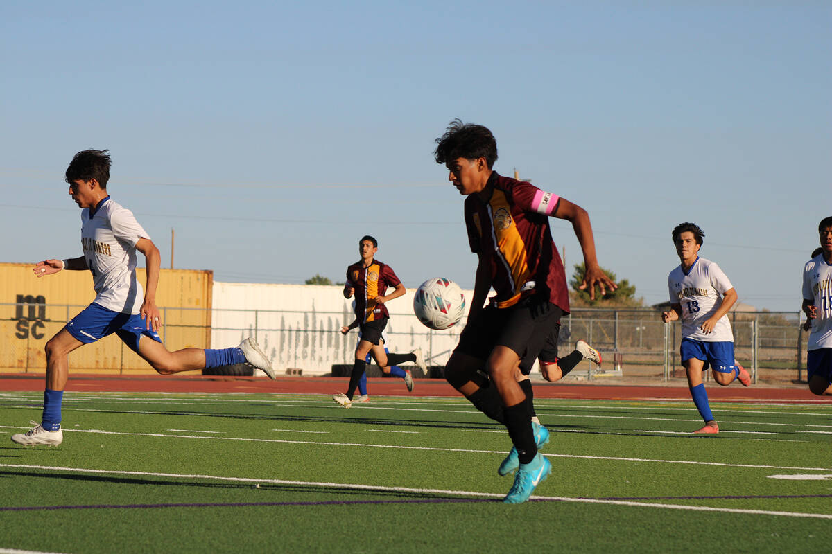 Pahrump Valley High School junior midfielder and co-captain Ryan Nunez Manzo advances the ball ...