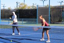 Pahrump Valley High School tennis senior Elise Eichner and head coach Michael Dela Rosa have so ...