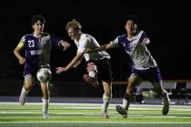 Pahrump Valley High School junior TC Hone gets his best shot on goal opportunity of the night i ...
