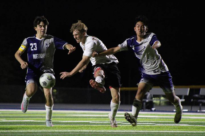 Pahrump Valley High School junior TC Hone gets his best shot on goal opportunity of the night i ...