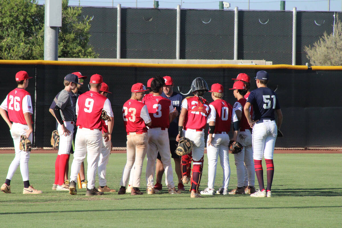 Top Tier Las Vegas head coach Patrick Flowers talks to the 16U squad following the conclusion o ...