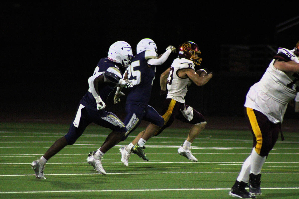 Pahrump Valley High School senior co-captain ATH,WR,FS Austin Alvarez returns an interception f ...