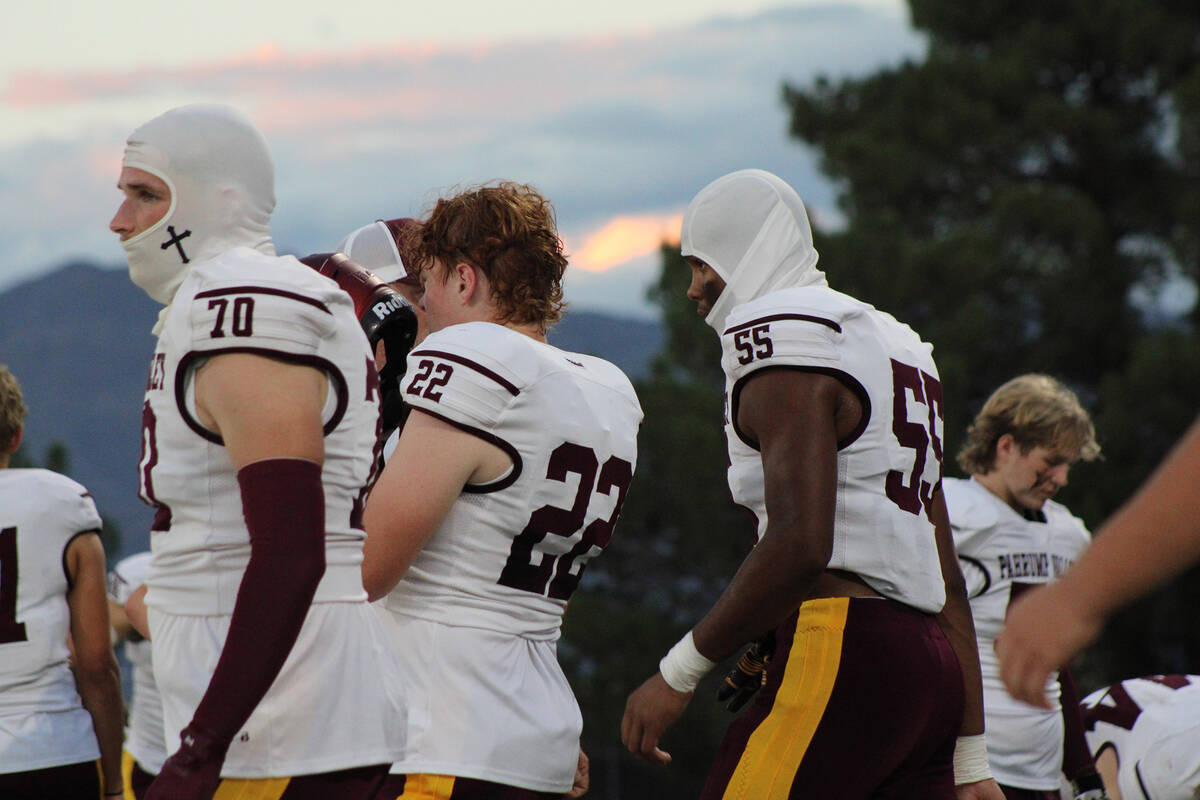 Pahrump Valley High School defenders senior ILB Joseph Mcdonald, junior DE/TE Paul Walker and j ...