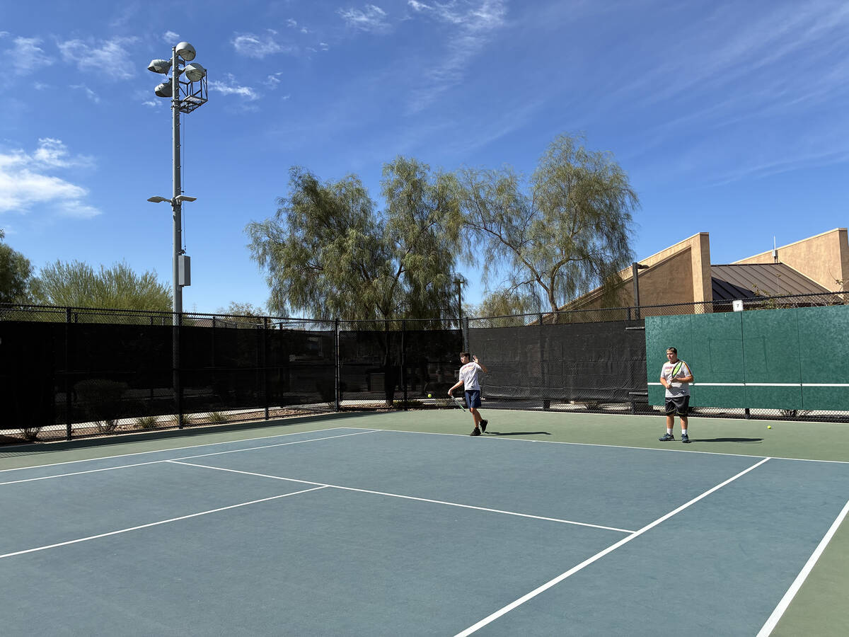 Pahrump Valley High School tennis players Lucas Johnson and Jace Eichner team up for a doubles ...