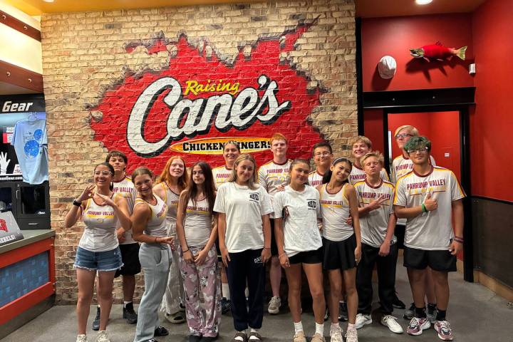 The Pahrump Valley High School tennis team enjoys a bite to eat at Raising Canes following a ro ...