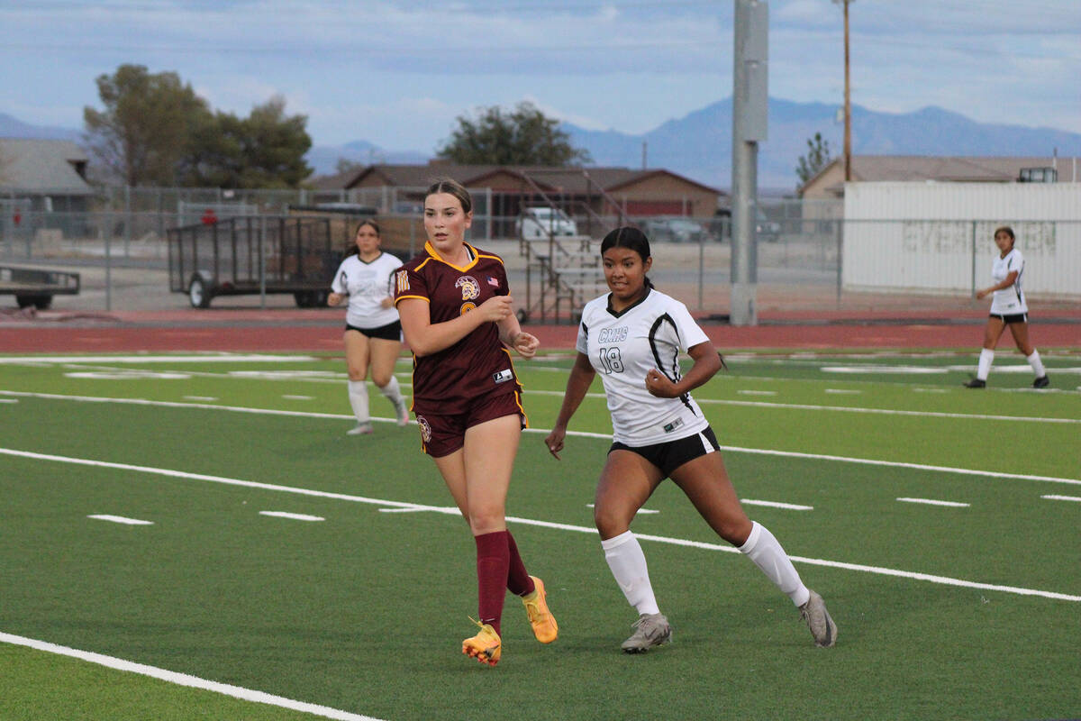 Pahrump Valley High School girls soccer junior Sydney Crotty gets off a clean pass against Cima ...