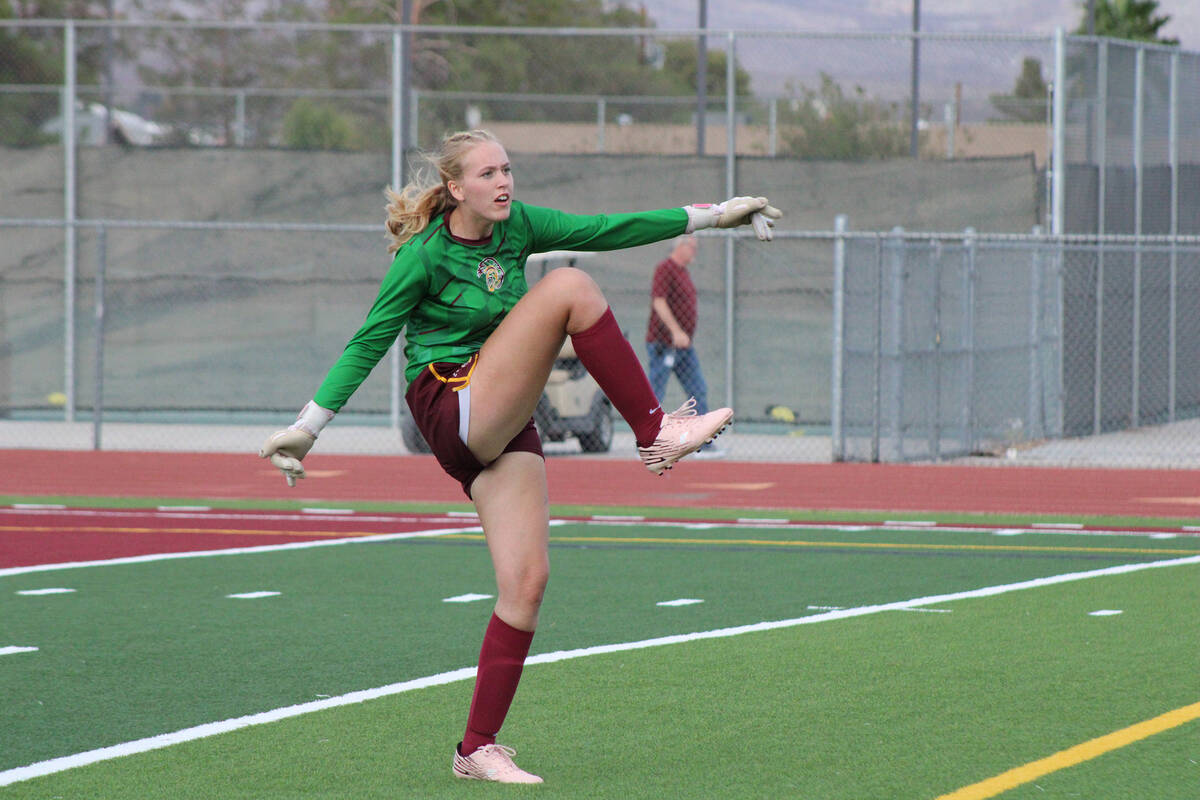 Pahrump Valley High School senior goalkeeper Julieanne Briggs sends a ball out on a free kick a ...