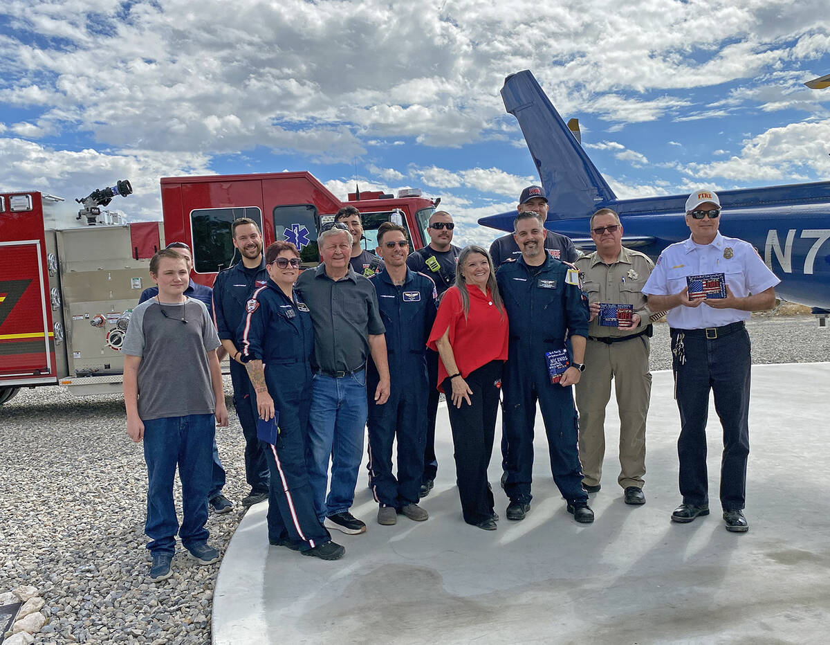 The Herl family of Pahrump gathered with local first responders from the sheriff's department, ...