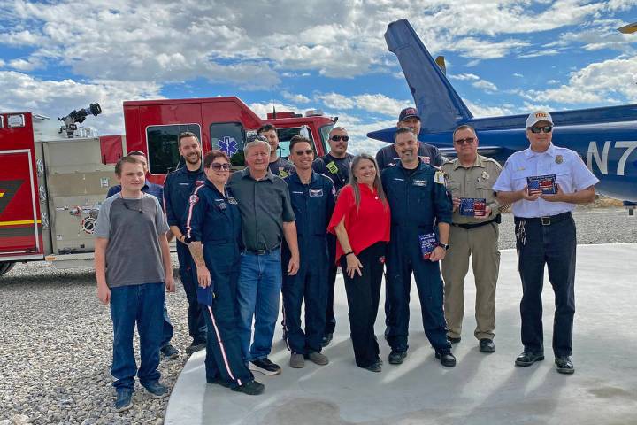 The Herl family of Pahrump gathered with local first responders from the sheriff's department, ...