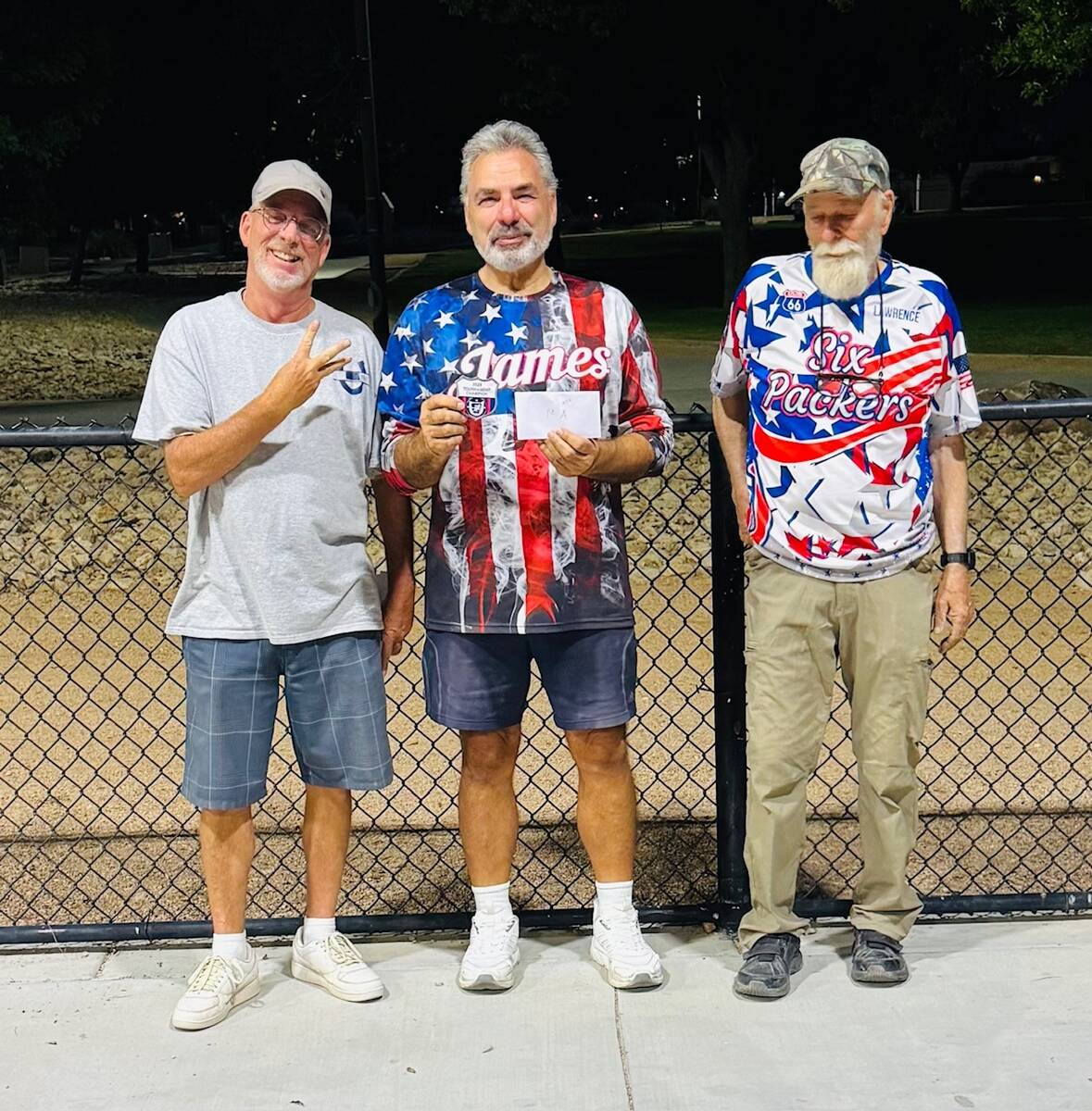 Nevada State Horseshoe Pitching Association pitchers Mark Kaczmarek (left), Jim Magda (middle) ...