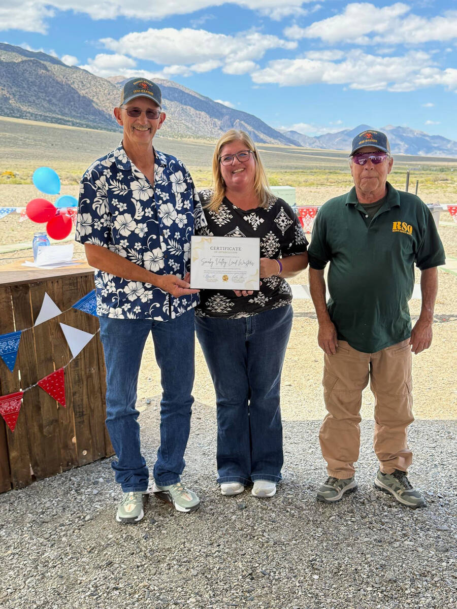 The Smoky Valley Lead Wasters Club, led by president Eric Merritt, left, and vice president Tom ...