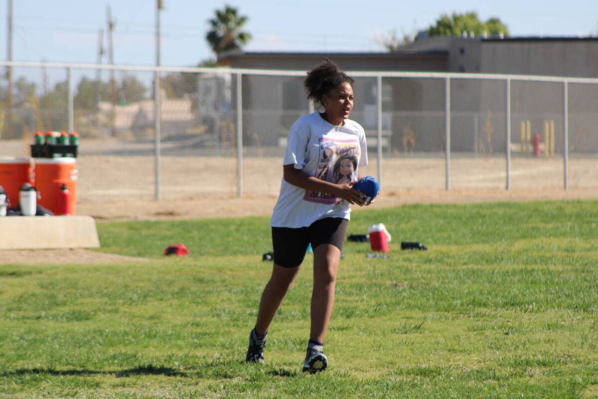 Pahrump Valley High School girls flag football senior Aaliyah Fries runs back to the line of s ...