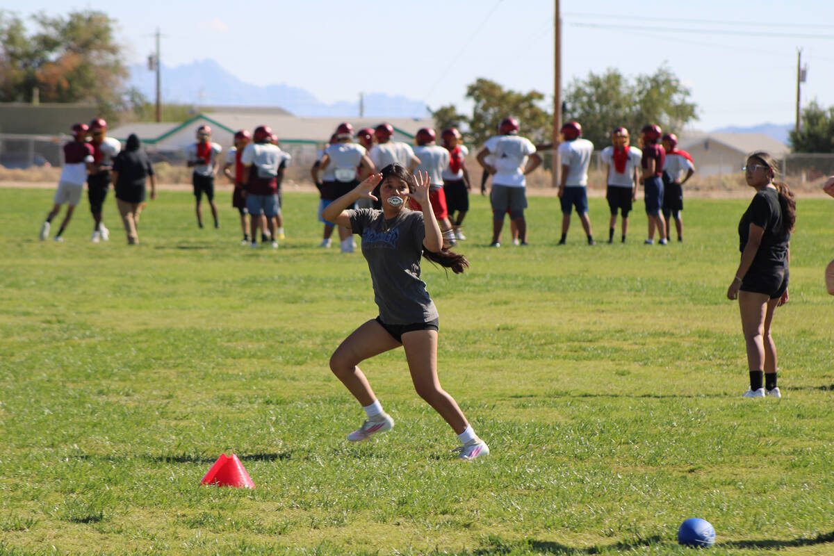 Pahrump Valley High School girls flag football sophomore Annika Moran-Maya goes out for a pass ...