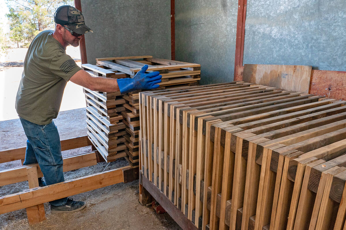 Partially assembled bedframe pieces are stacked in readiness for completion at the 2025 Bunks A ...
