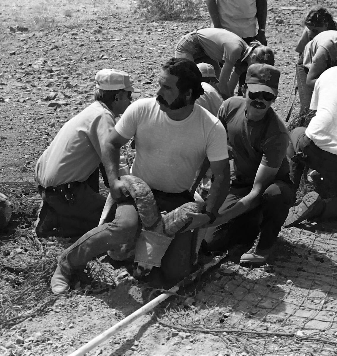 Jim Lusk, center, was a passionate wildlife biologist for roughly three decades and he particip ...