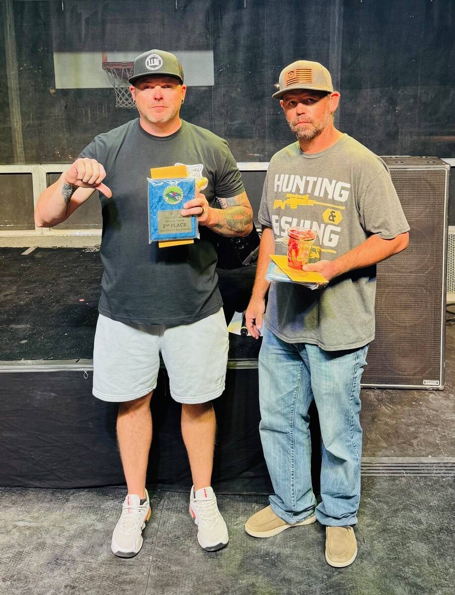 Southern Nevada Cornhole Society pitchers Brian McMahon and Joey Monahan jokingly pout in prote ...