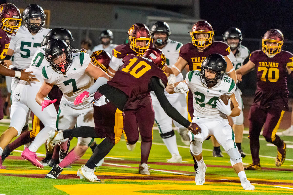 Virgin Valley High School junior OLB/RB Drew Dixon was explosive against the Trojans as the jun ...