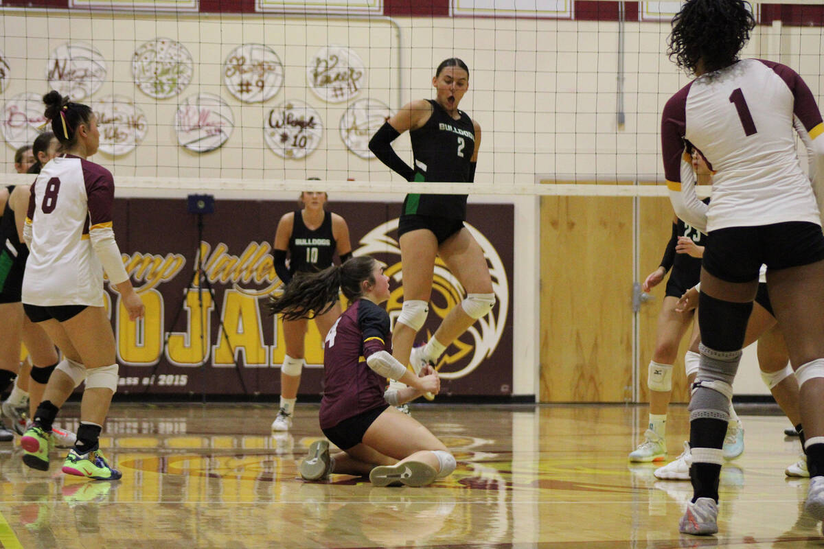 Pahrump Valley High School girls volleyball Sedona Norton gets down low to dig out a dying ball ...