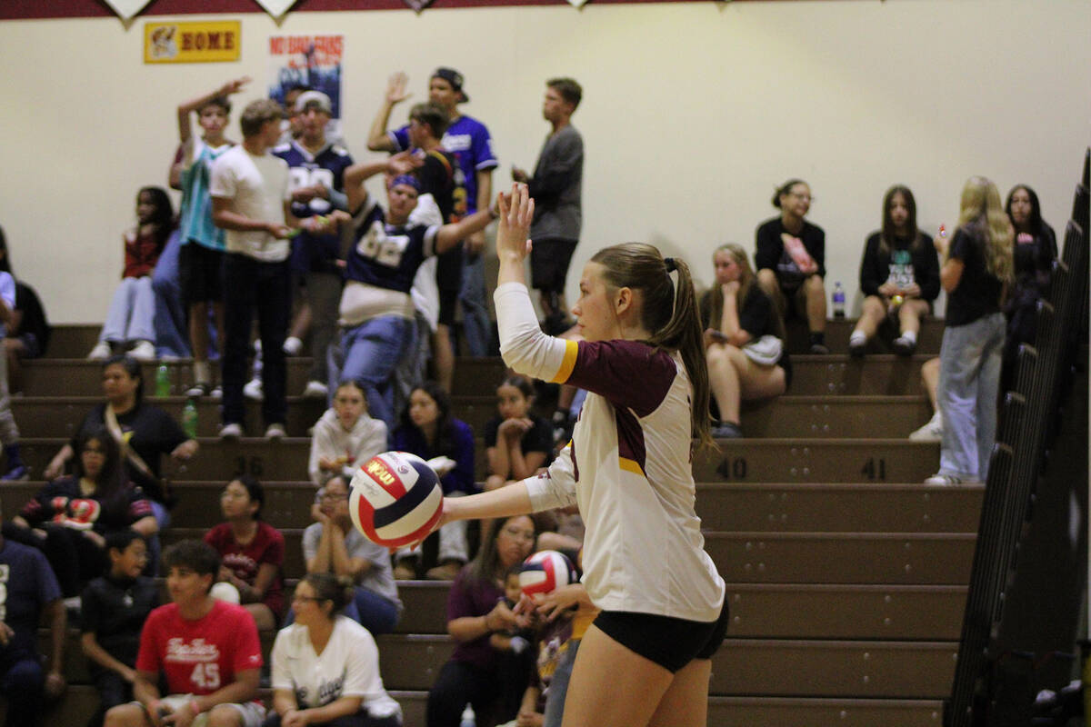 Pahrump Valley High School girls volleyball senior Nala Dalton gears up to whip up a serve agai ...