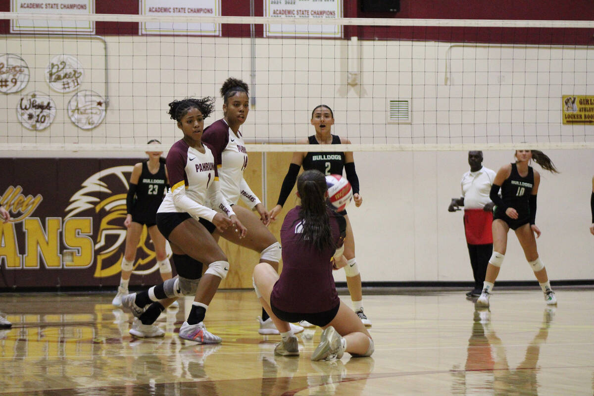 Pahrump Valley High School girls volleyball sophomore Sedona Norton sets a dig against the Bull ...