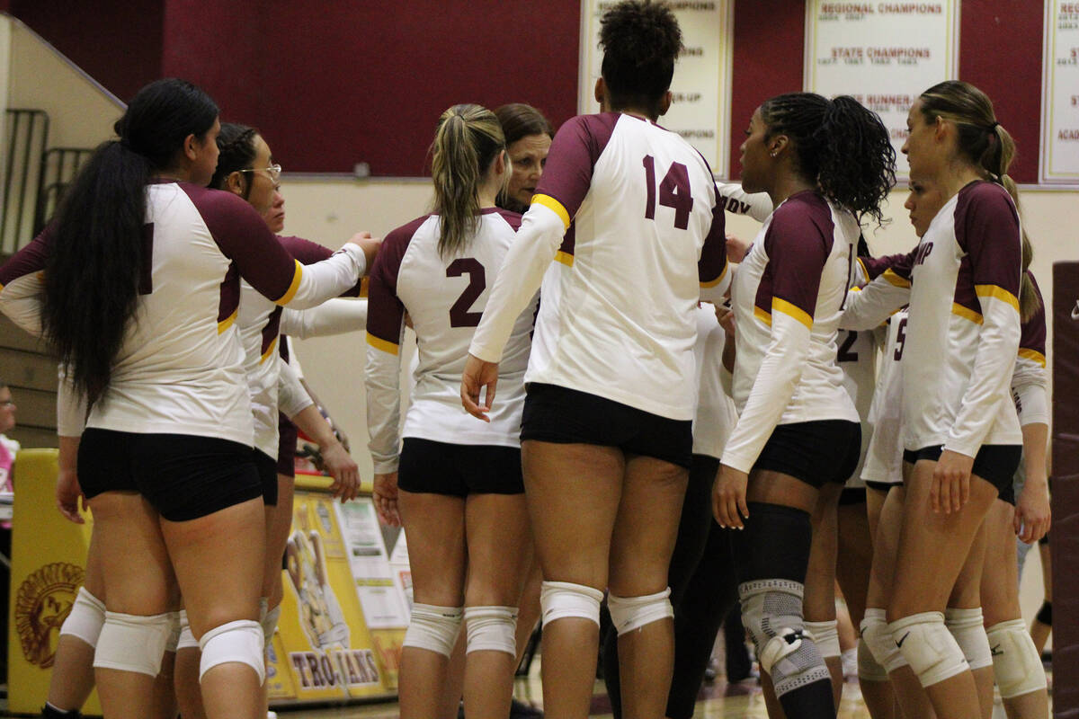Trojans head coach Amber Lugo attempts to pump up her squad during a timeout in a home league m ...