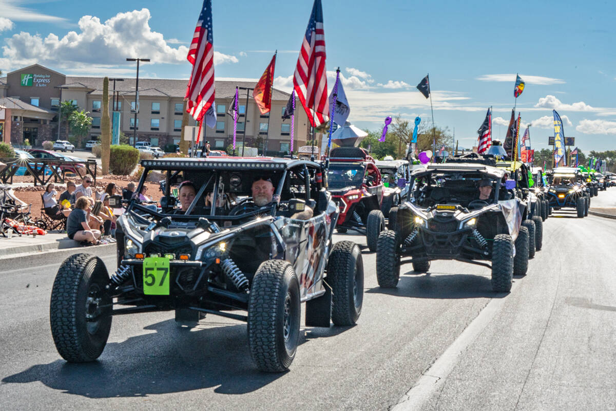 Revving up the crowd lining Highway 160 for the Pahrump Fall Festival Parade, a series of side- ...