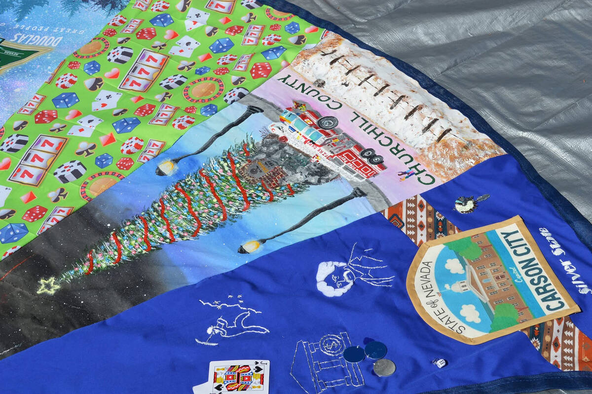 Sewing groups in each of Nevada's 17 counties worked to create panels depicting their county's ...