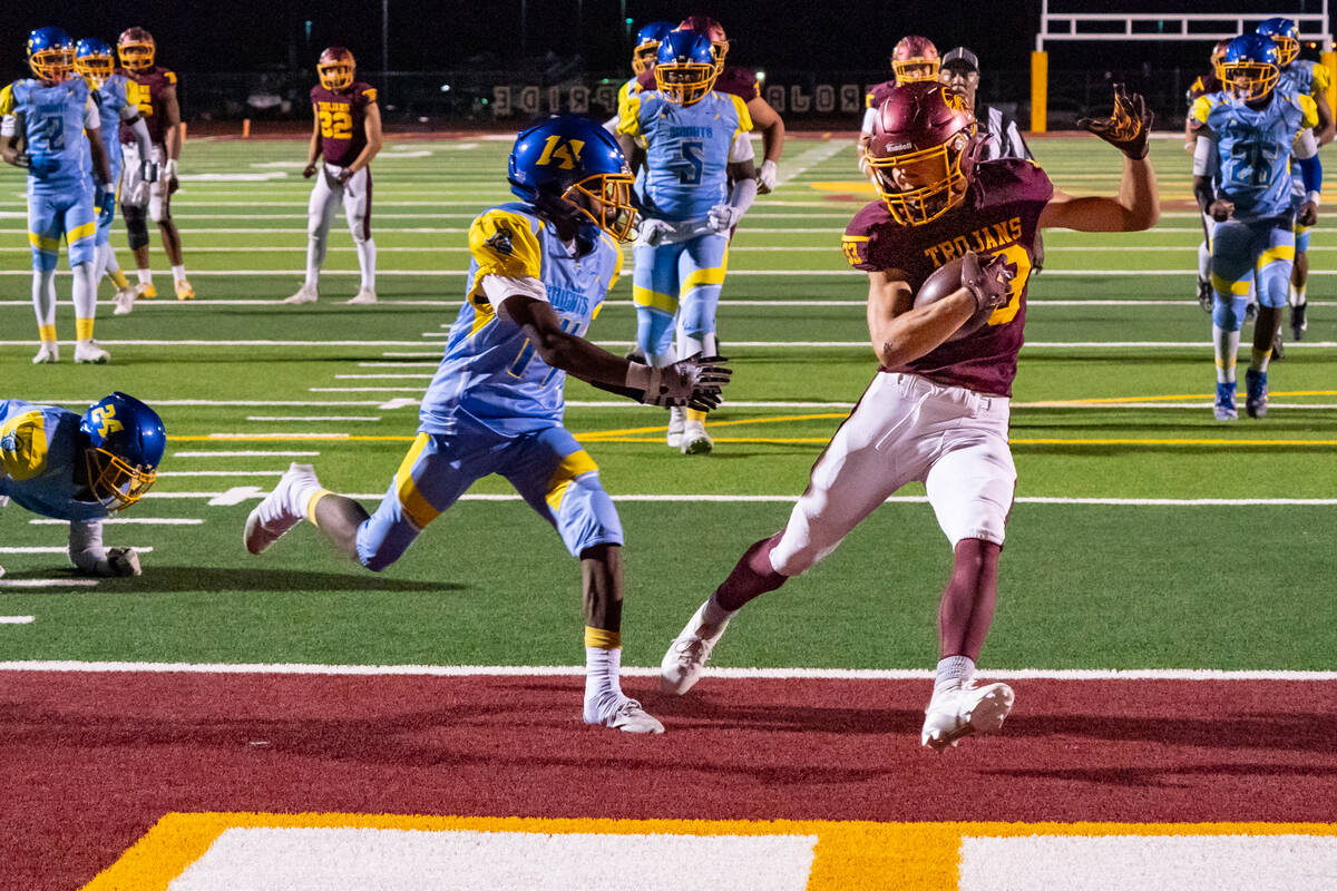 PVHS senior ATH/WR/FS Austin Alvarez reels in a touchdown pass from senior quarterback Kayne Ho ...