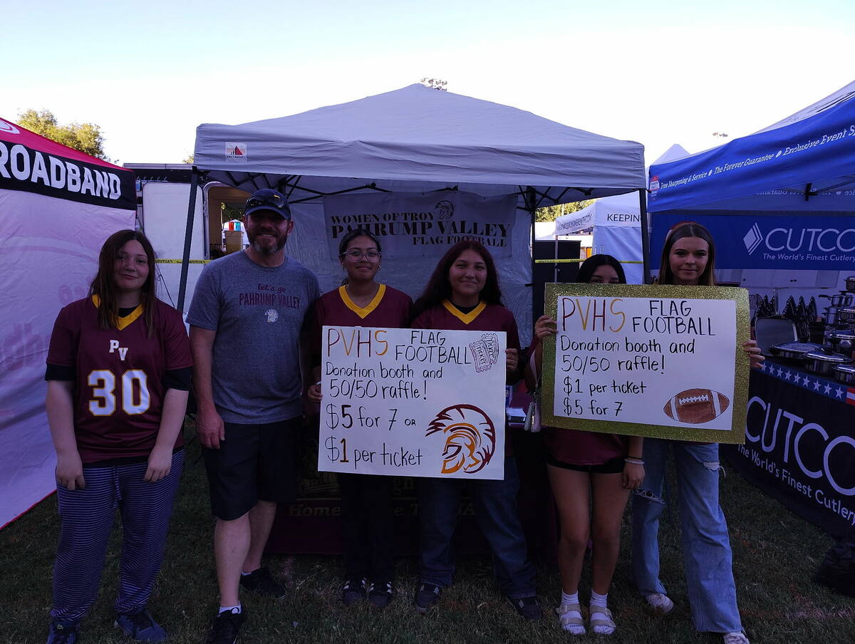 Head coach Jeff Corbet and the Pahrump Valley High School girls flag football program raised ne ...
