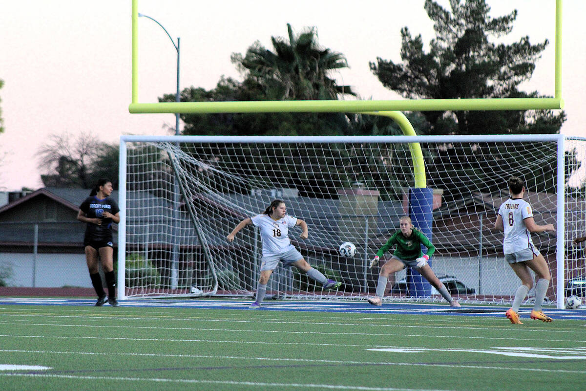 PVHS senior's Delaney Abbatte and Julieanne Briggs attempt to save a shot on goal against Deser ...