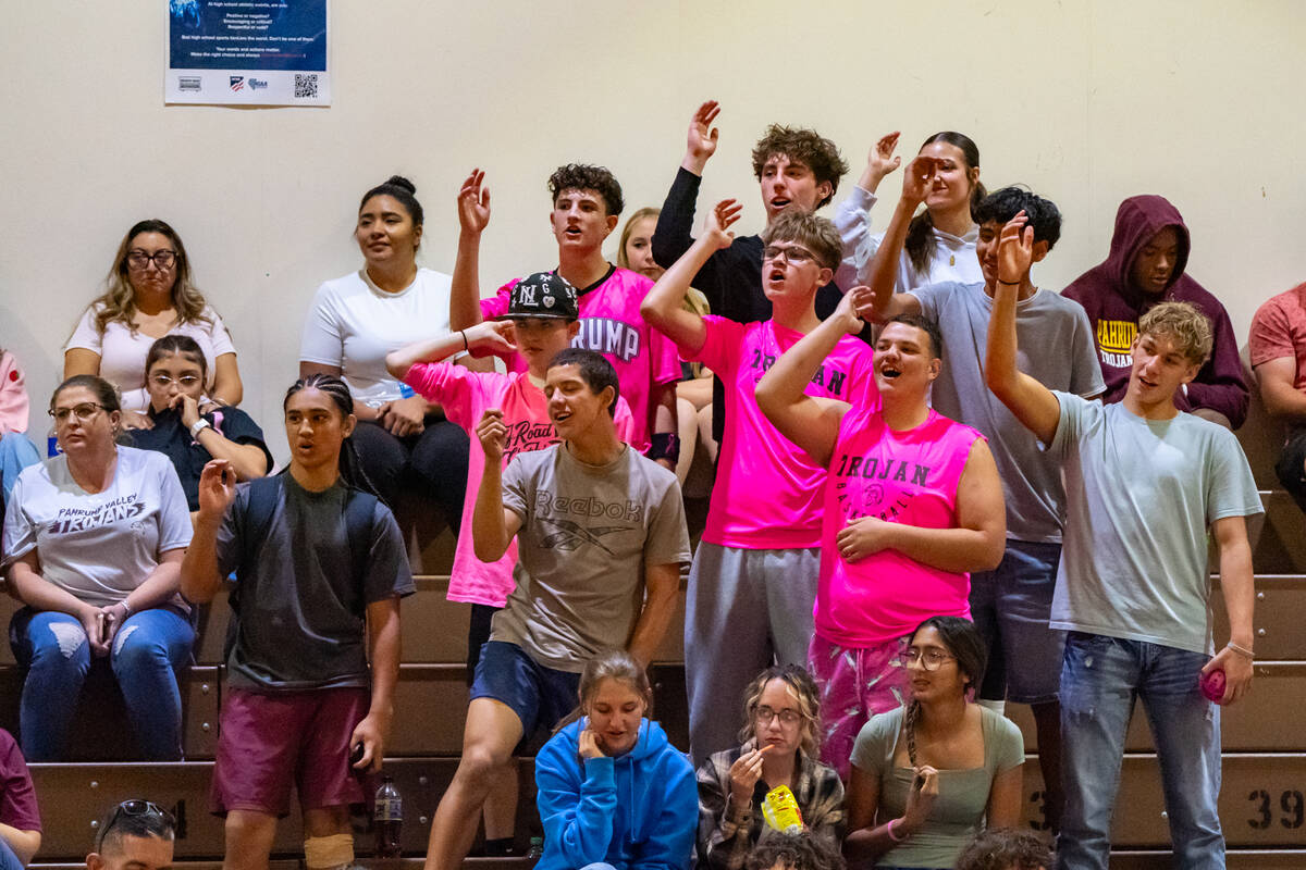 The PVHS student section proudly supports their girls on the court in pink as they cheer on the ...