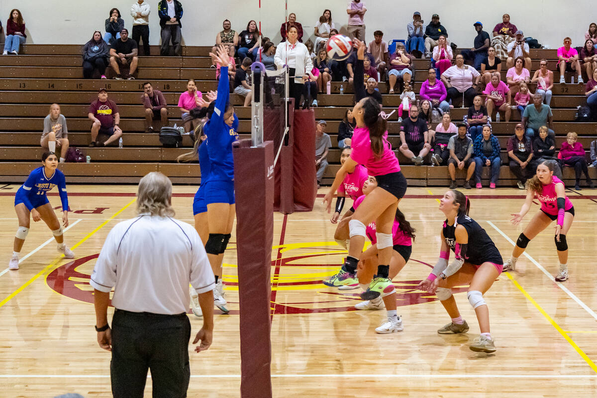PVHS junior OH/RS Xe'ane Kamanu sets herself up for a kill in a home league match vs. Cristo Re ...