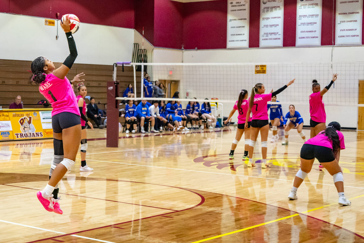 PVHS girls volleyball senior OH/RS/MB Heavenly Ware serves up a nice shot during a home league ...