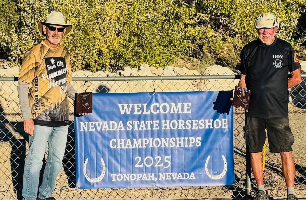 Nevada State Horseshoes Pitching Association pitcher Scotty (Dawg) Hardy and Don Brown display ...