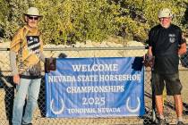 Nevada State Horseshoes Pitching Association pitcher Scotty (Dawg) Hardy and Don Brown display ...