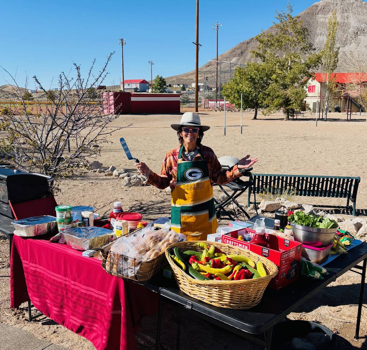 Helen and Lance from Round Mountain cooked burgers and hotdogs for the crowd. (Lathan (Rebel) D ...