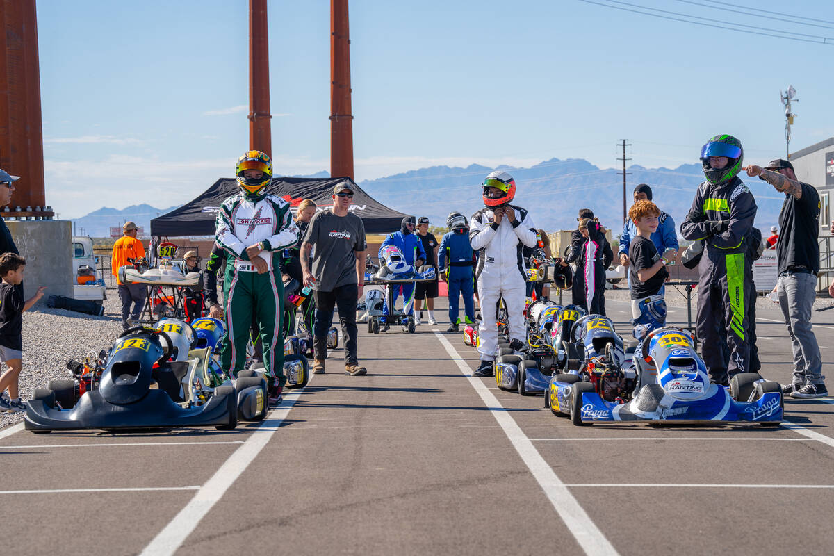 SMK Race Series racers get ready to jump in their karts to hit the track during the first race ...
