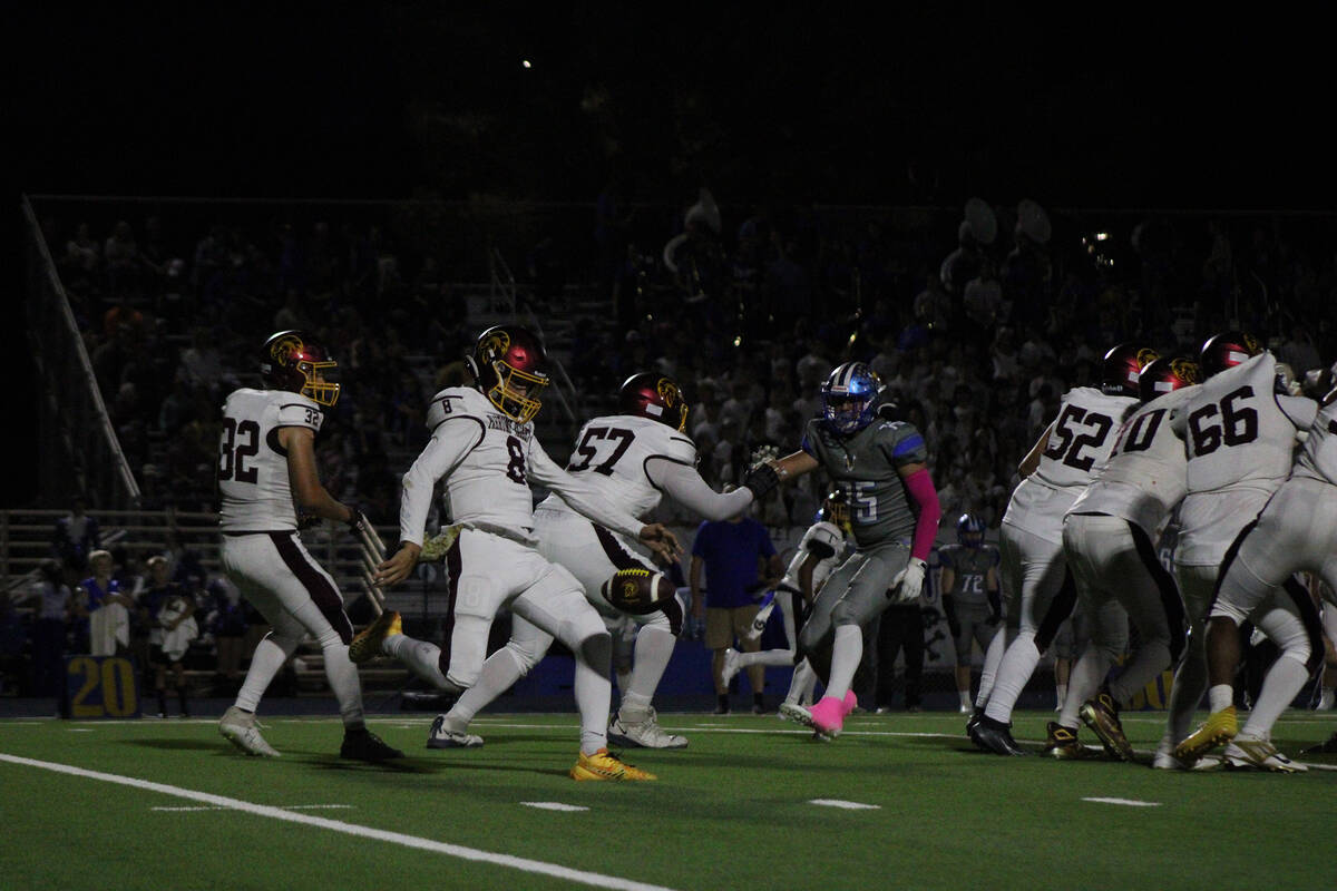 PVHS senior quarterback Kayne Horibe prepares to boot a punt deep in an away league game agains ...