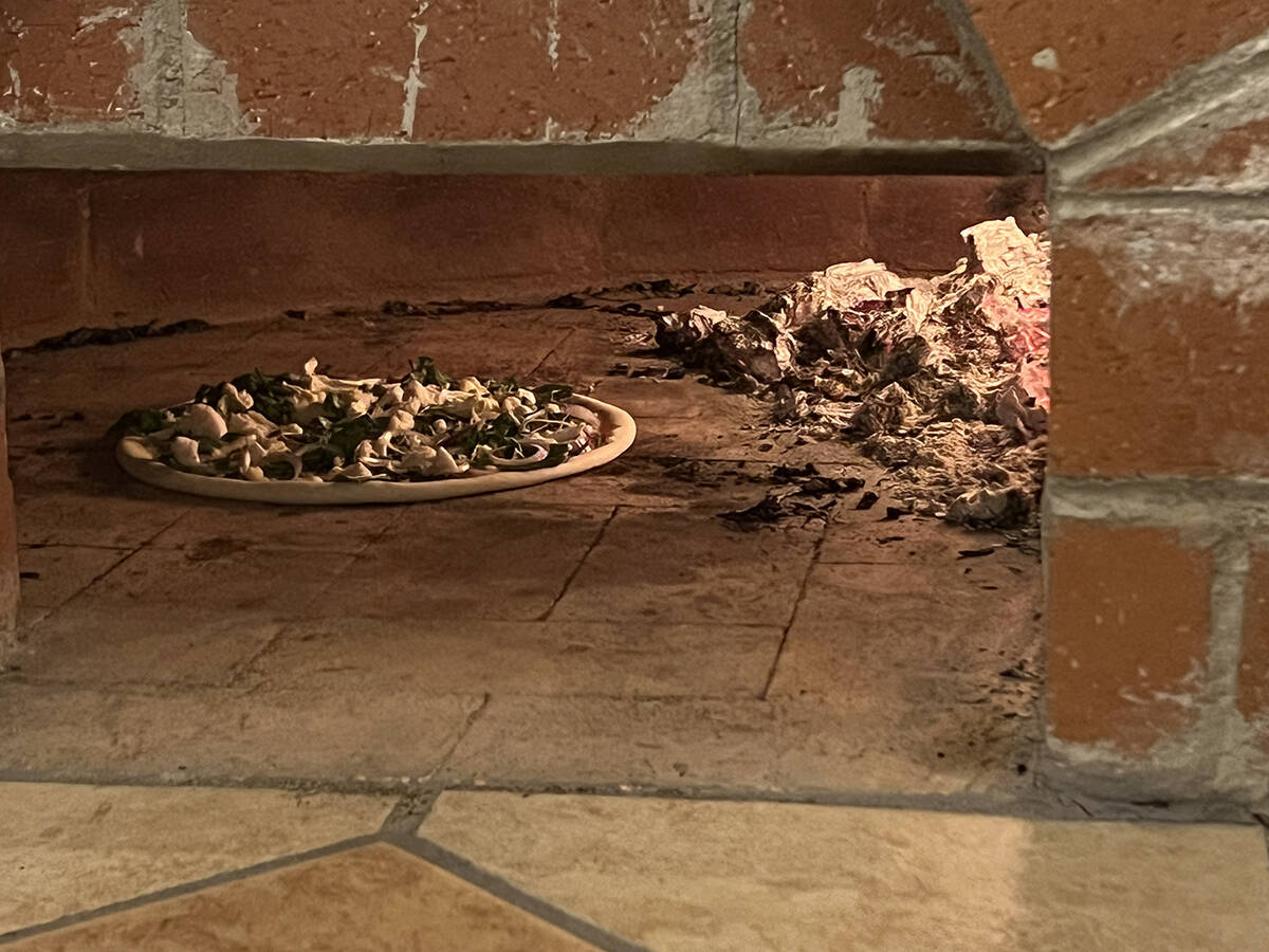 “About four years ago, my friends decided to open up that cafe next door. They built a wood-f ...