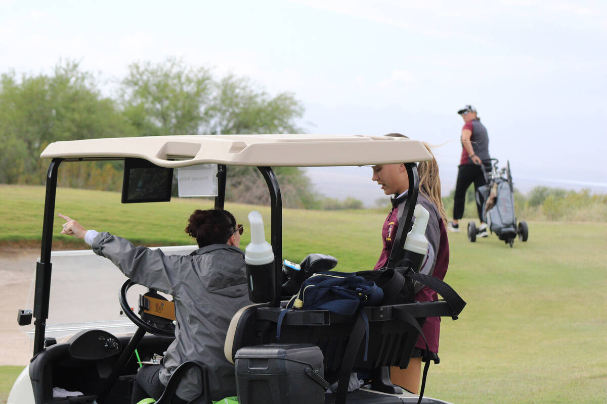 PVHS girls golf head coach Sierra McKillips talks to Saldana to try and ease her nerves during ...
