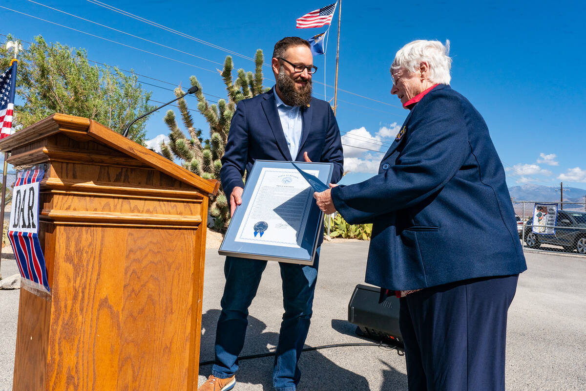 Nevada State Assemblyman and Assembly Minority Leader Greg Hafen II gifts a proclamation to Rob ...