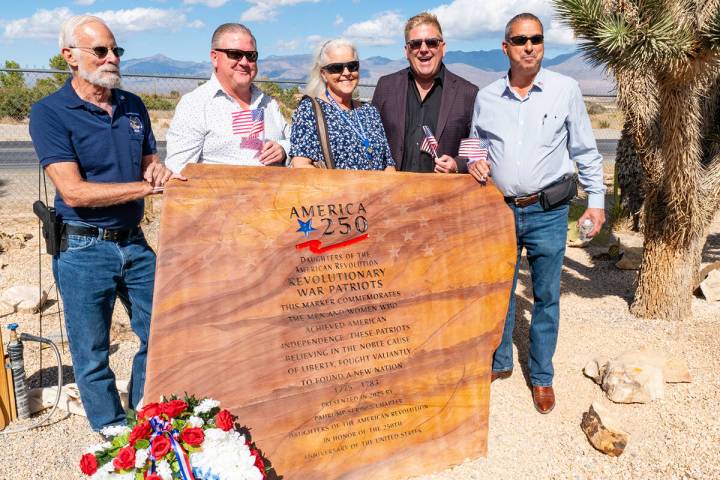 (From left to right) District 2 Commissioner John Koenig, County Manager Brett Waggoner, Distri ...