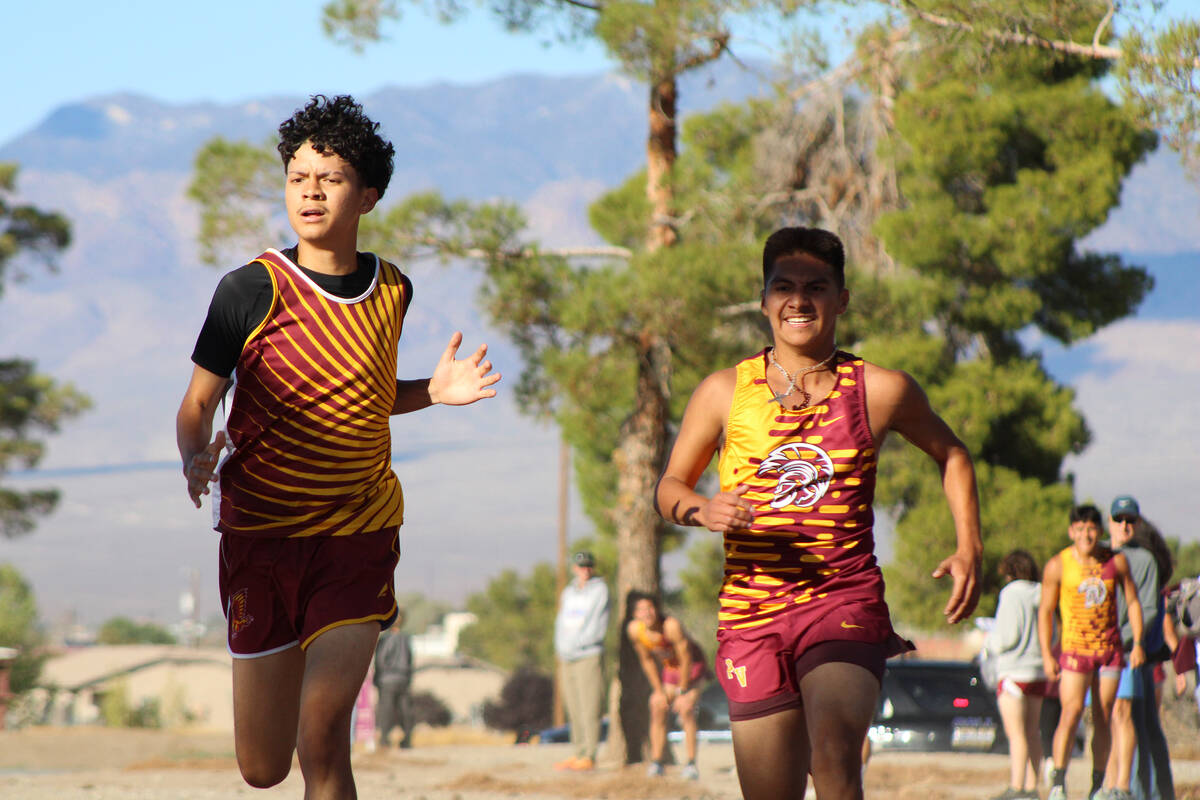 PVHS XC's Alexander Martinez picks up the pace in the last sprint of the race to tie with El Do ...