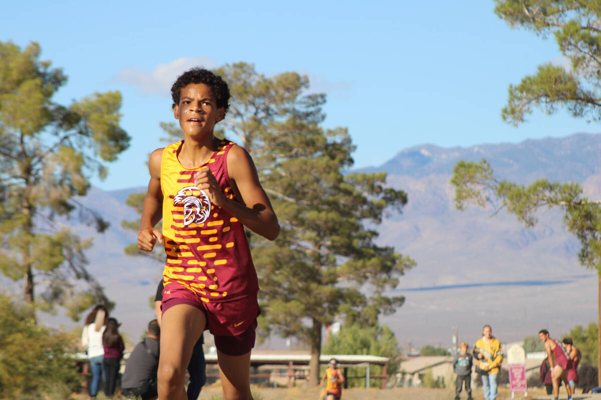 PVHS XC's Manny Dulpart charges hard to the finish line in the Pahrump Weekday home meet held a ...