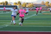 Pahrump Valley High School girls soccer senior co-captain Aubree Williams advances the ball dur ...