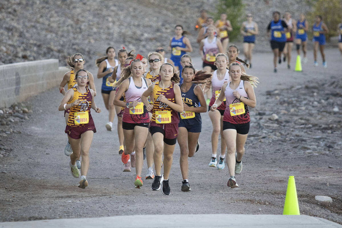 The Pahrump Valley High School girls cross country team is led in front of the pack by Rylan Bl ...