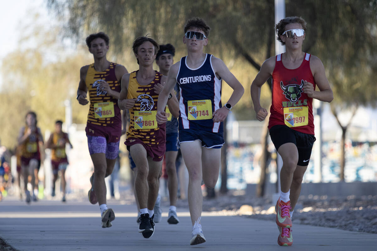 PVHS XC runner Timothy Stutzman tries to keep up with SLAM's! Thomas Delany and Founders Academ ...