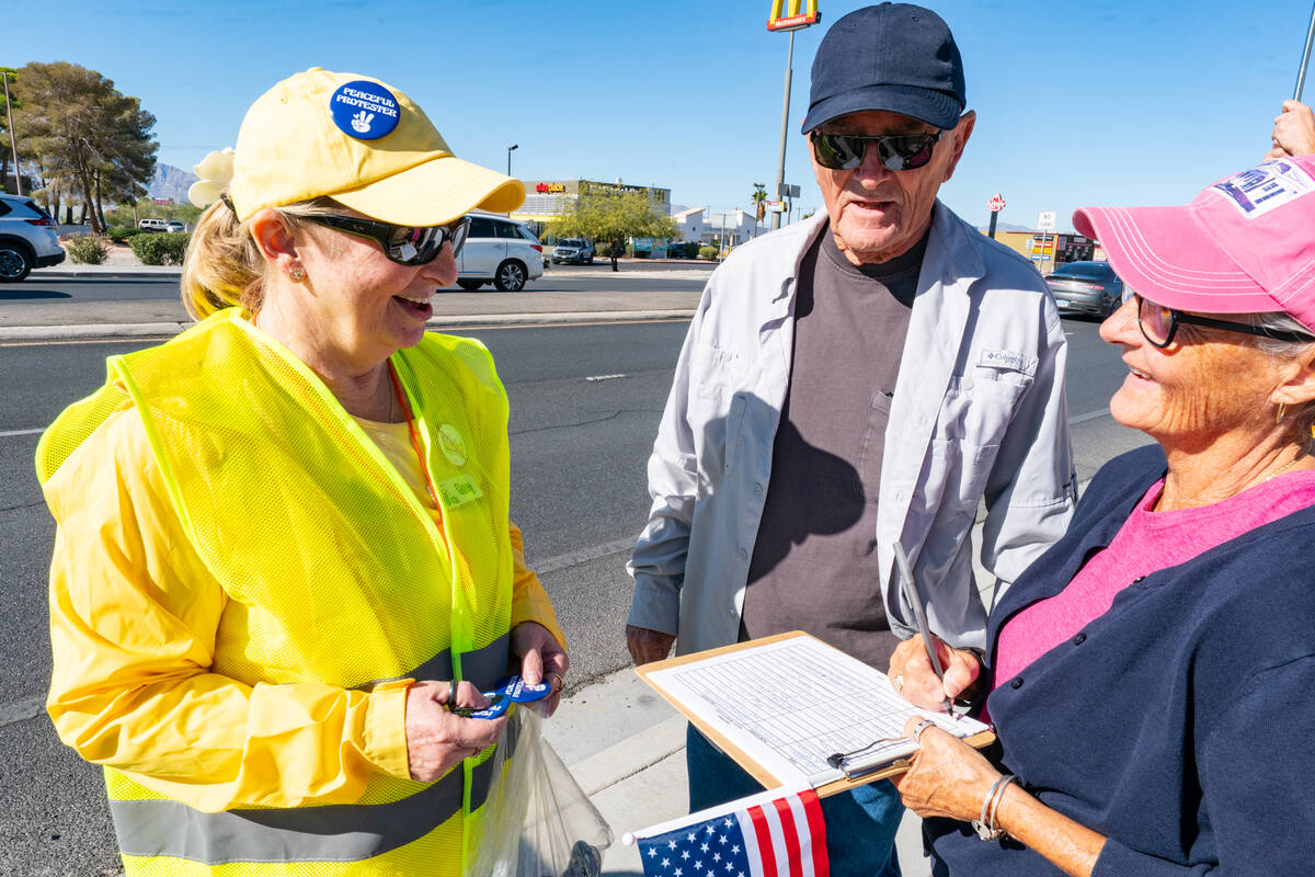 Ginny Okawa (l), one the organizers of the rally and a member of the local Indivisible Prickly ...