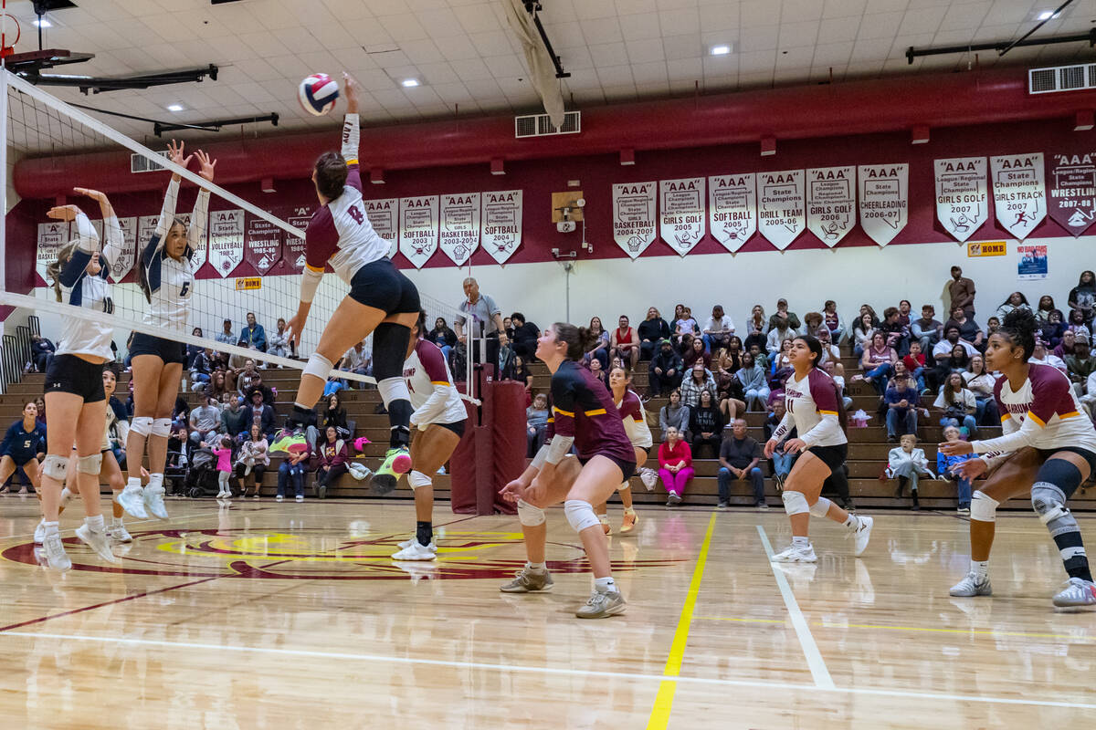 PVHS junior OH/RS Xe'ane Kamanu extends fully to get the most behind a kill during a home leagu ...
